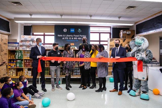 BSE418615 20220301 PS12RibbonCutting ACJ 2295