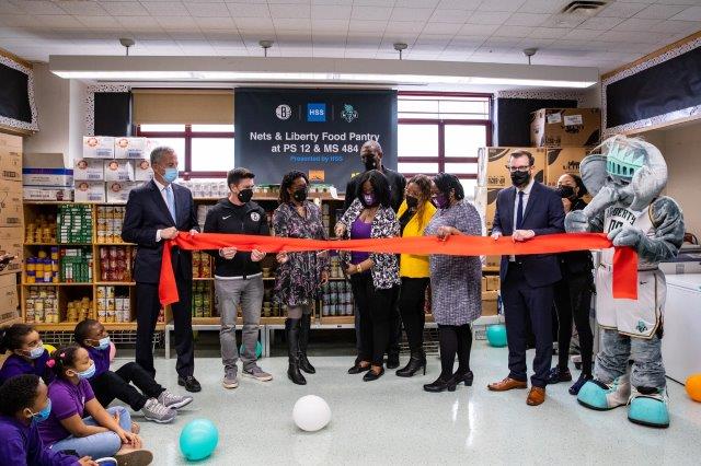 BSE418645 20220301 PS12RibbonCutting ACJ 2296