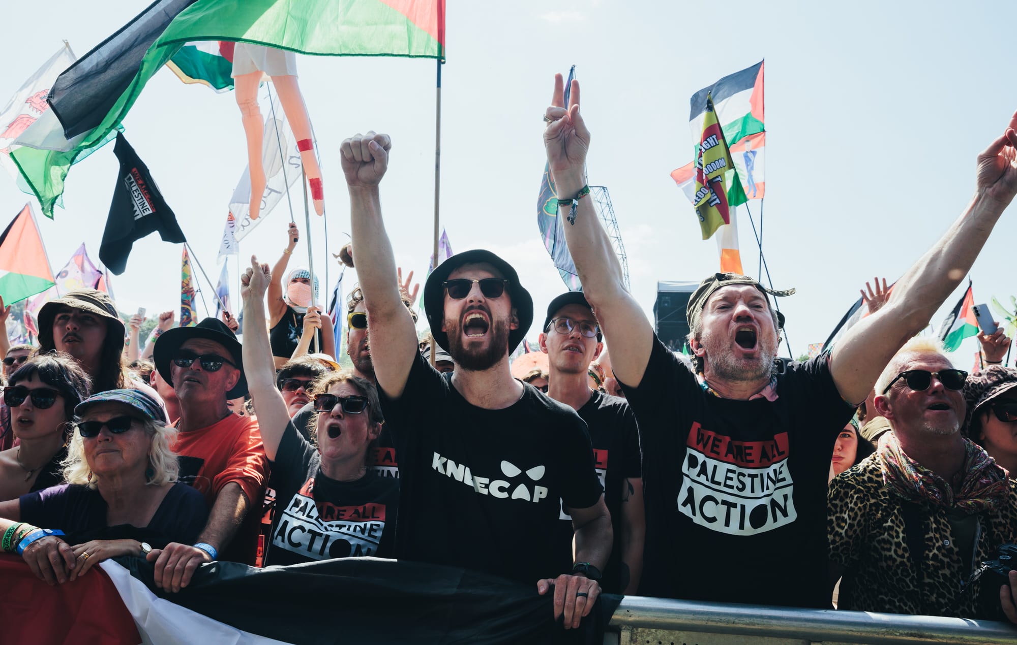 Crowds at the West Holts stage as Kneecap perform at Glastonbury 2025, photo by Andy Ford