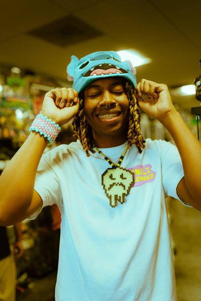 Lonely Leonard Unveils Raw Artistry in Debut Album ‘BLOCKBUSTER’